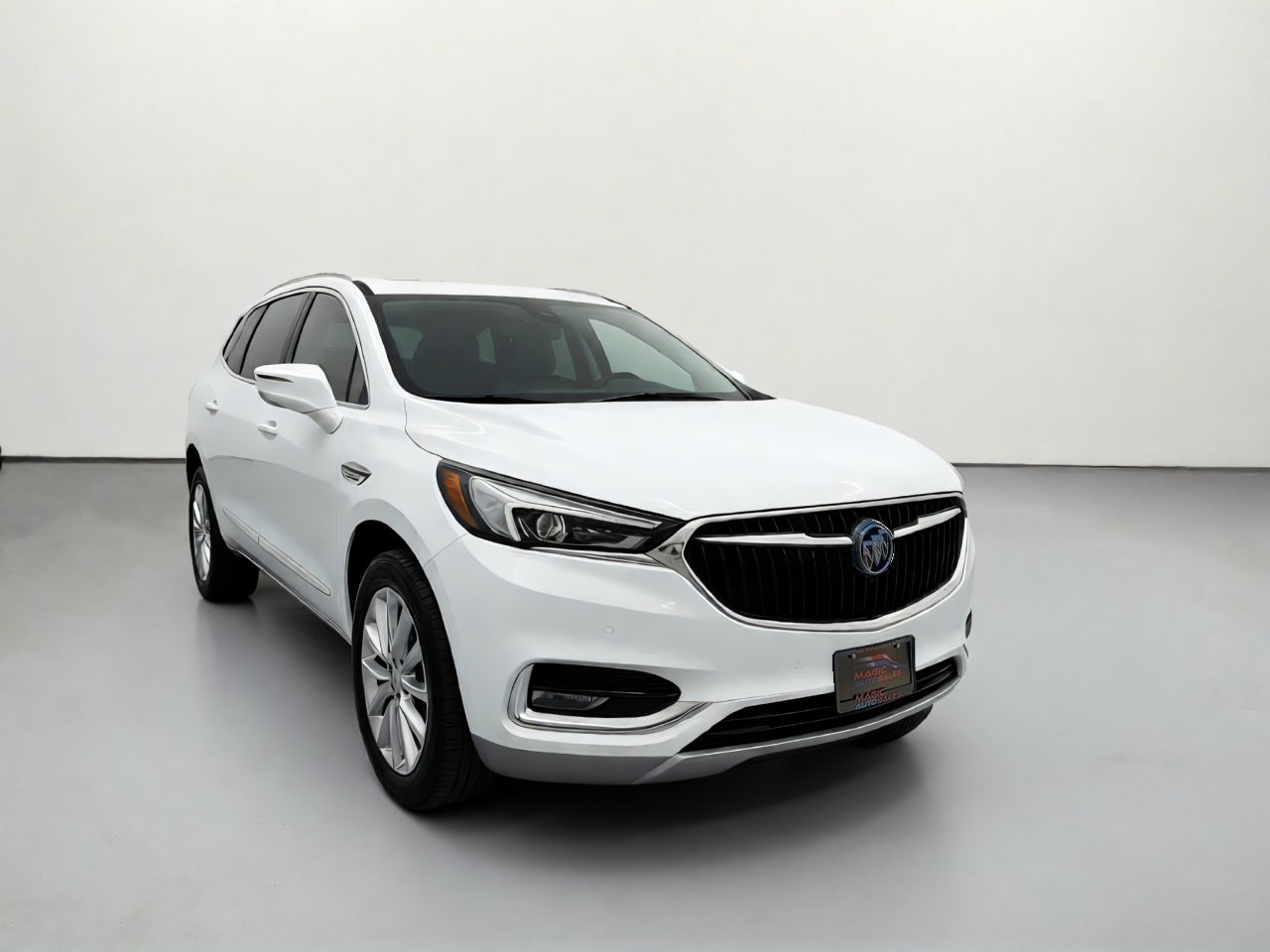 White Buick Envision photographed in a clean virtual studio